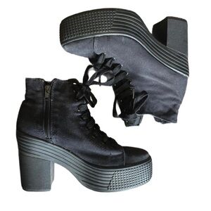 Black “JC Play” by Jeffrey Campbell chunky platform ankle boots with a zipper